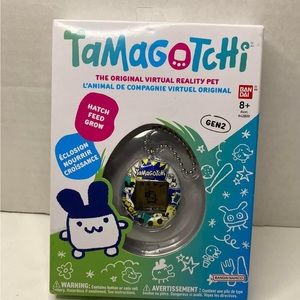 **SOLD** Tamagotchi and keychain